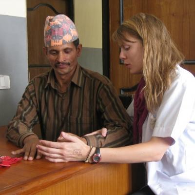 A professional physiotherapist in Kathmandu helping a local man whilst on her Projects Abroad physiotherapy work experience in Nepal. Gain physiotherapy work experience in Nepal and help local children and adults whilst on an physiotherapy internship with Projects Abroad.
